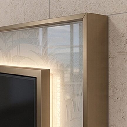 Bronze frame against coral stone